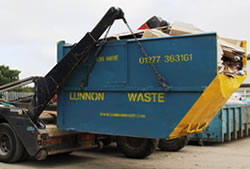Skip Hire in Brentwood full skip being unloaded